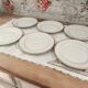 Set of 6 fine porcelain dessert plates from Bohemia with a gold rim.