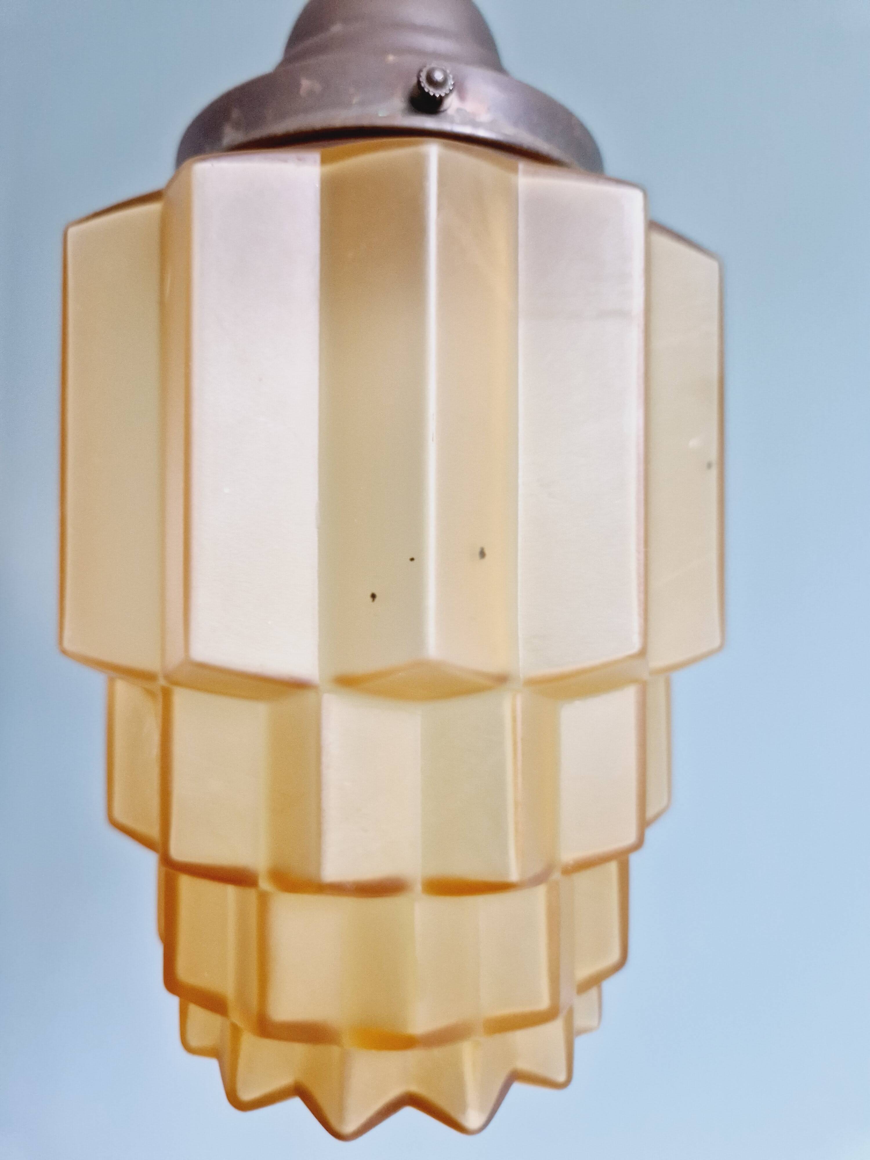 Art Deco Skyscraper type pendant lamp in amber glass, 1920s-30s