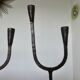 Pair of antique wrought iron candlesticks