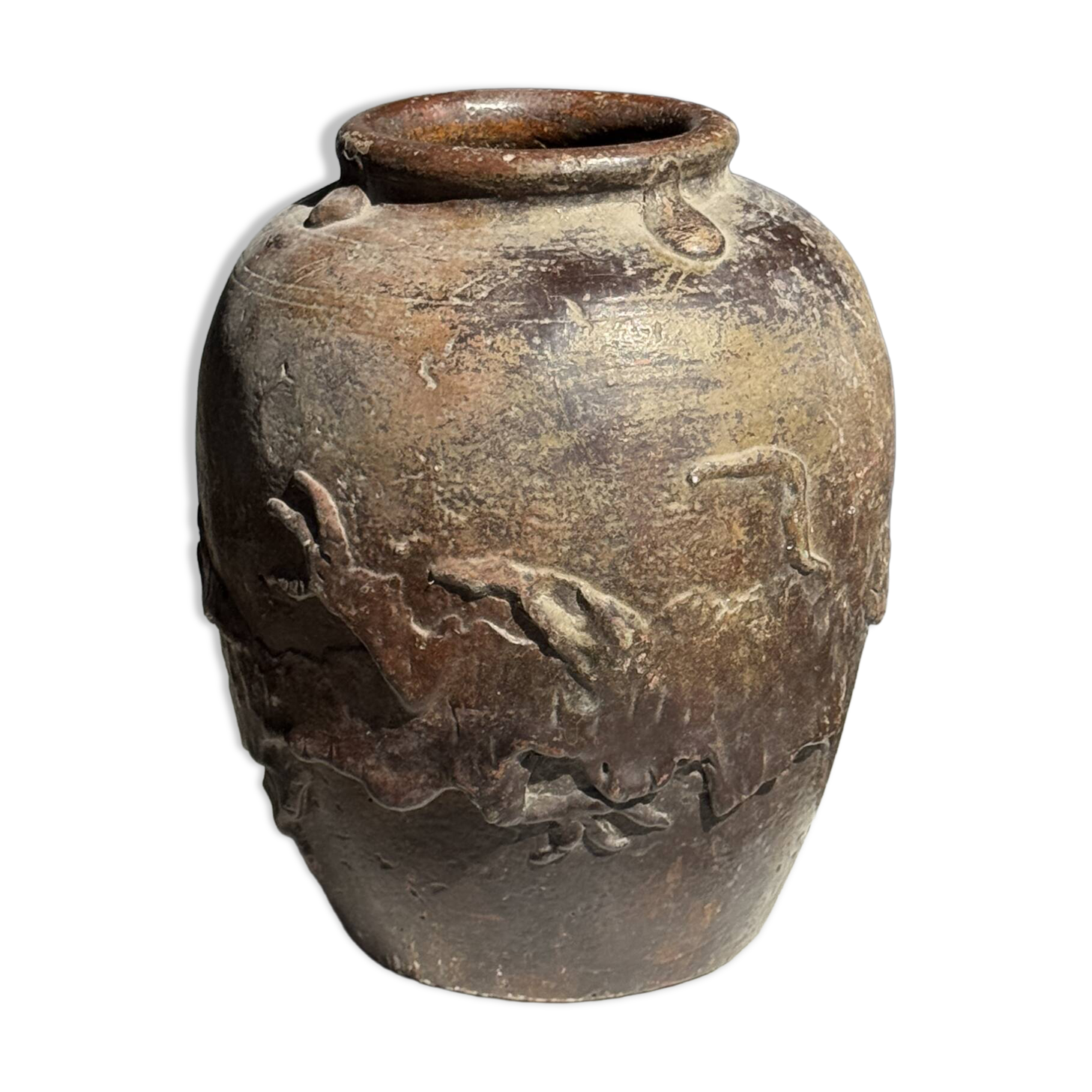 Large traditional Indonesian clay pot featuring a dragon.