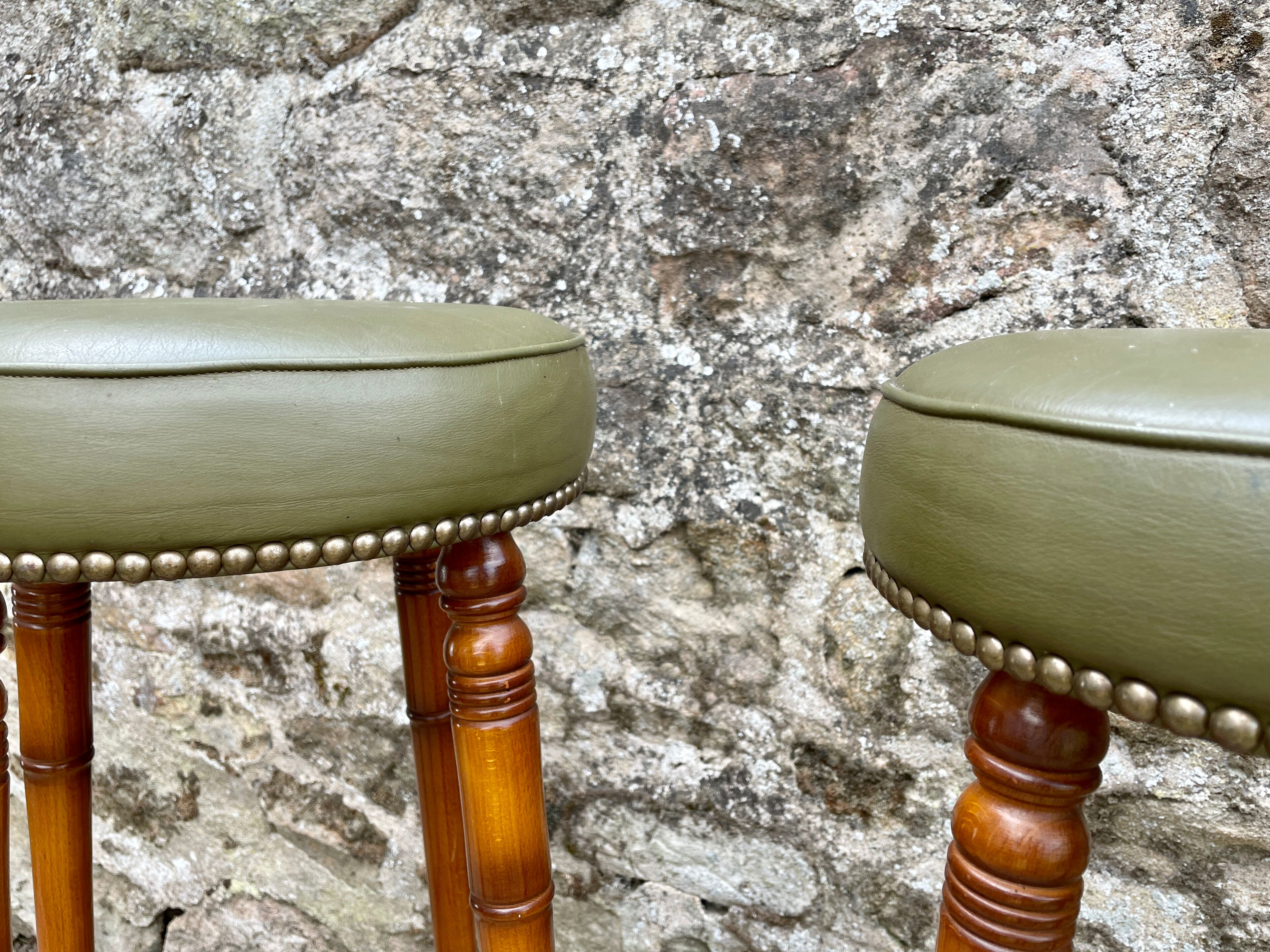 Trio of leather bar stools