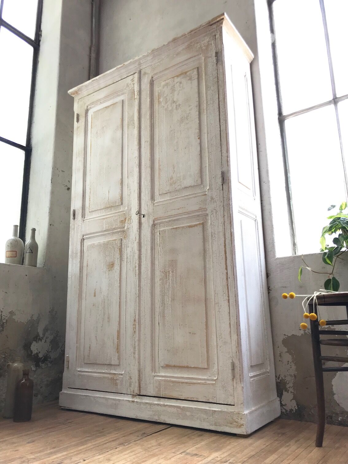 Antique wardrobe in patinated pine