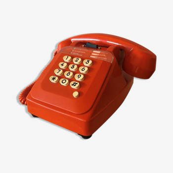 Orange Socotel phone with keys from the 70s 80s