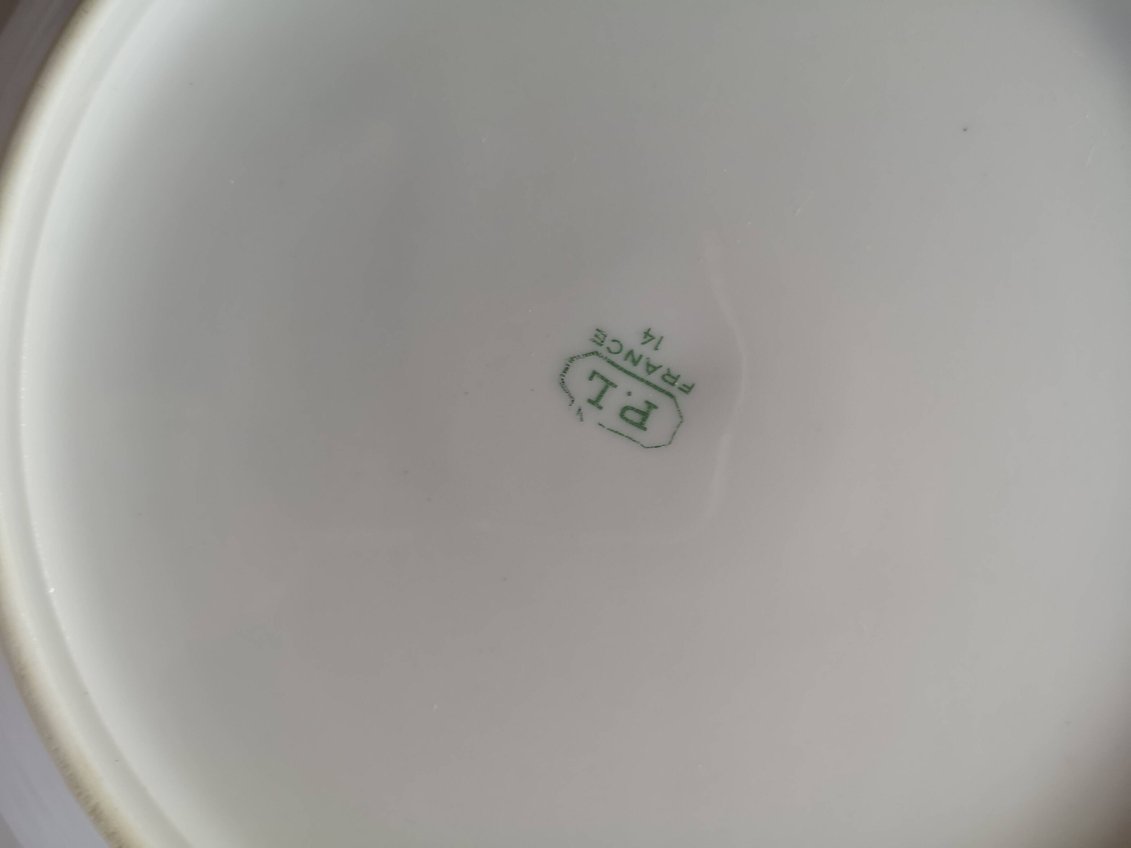 12 antique deep plates in French porcelain