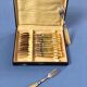 Brass and yellow galathite cake forks