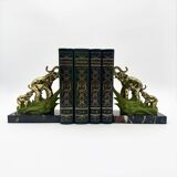 Art Deco bookends with elephants in brass and marble.