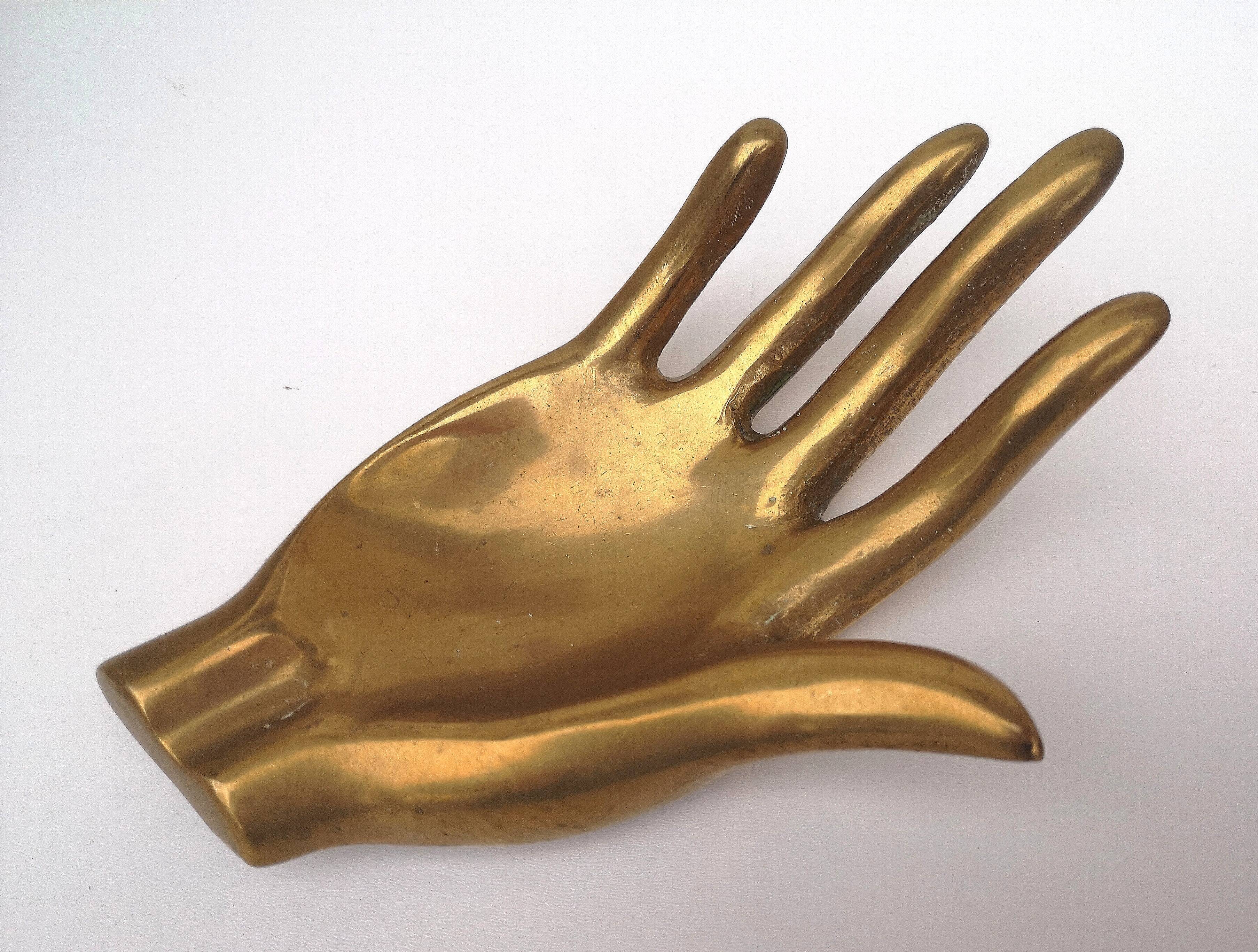 Hand, vintage ashtray, bronze
