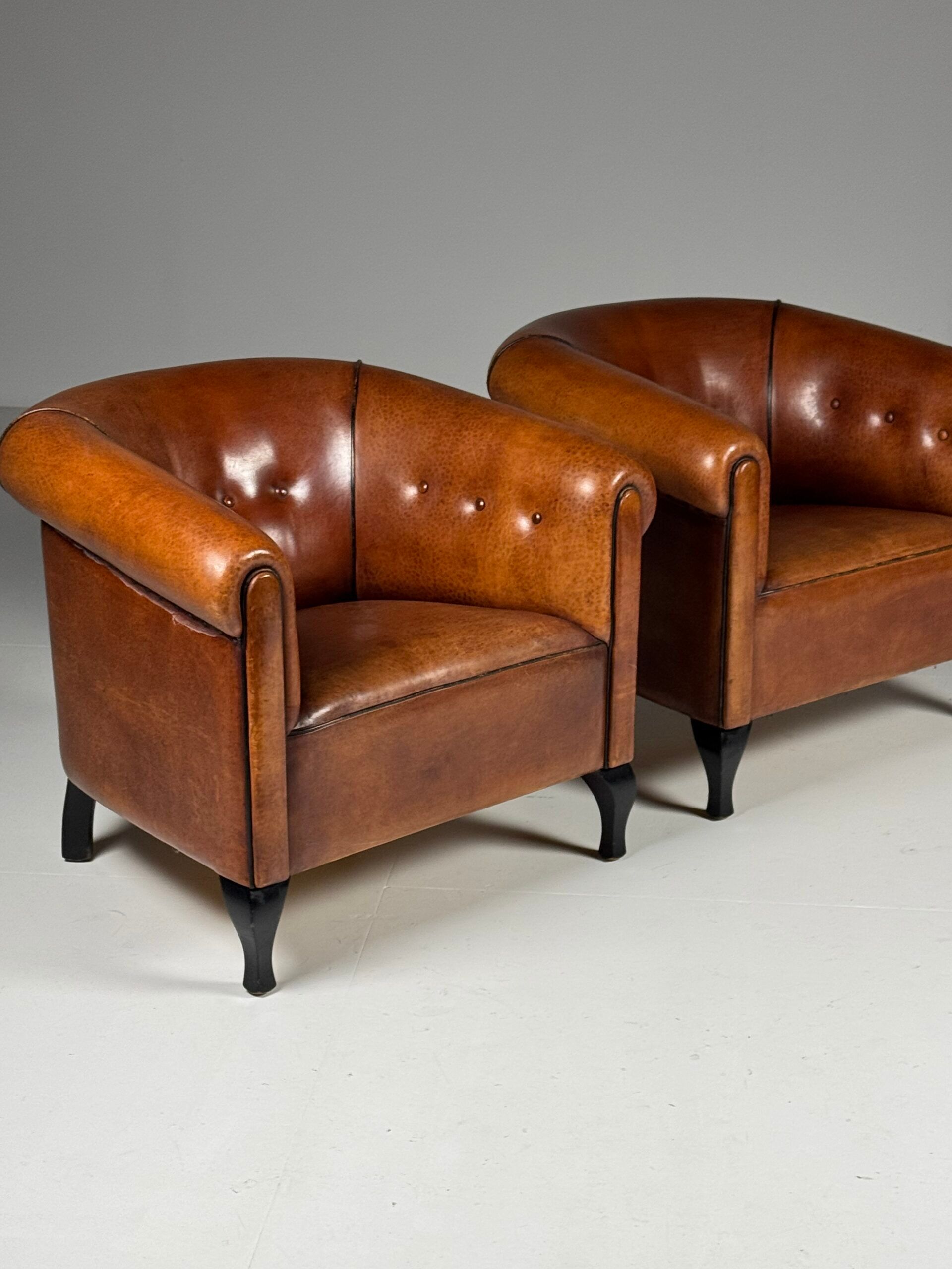 Ensemble de 2 fauteuils club en peau de mouton