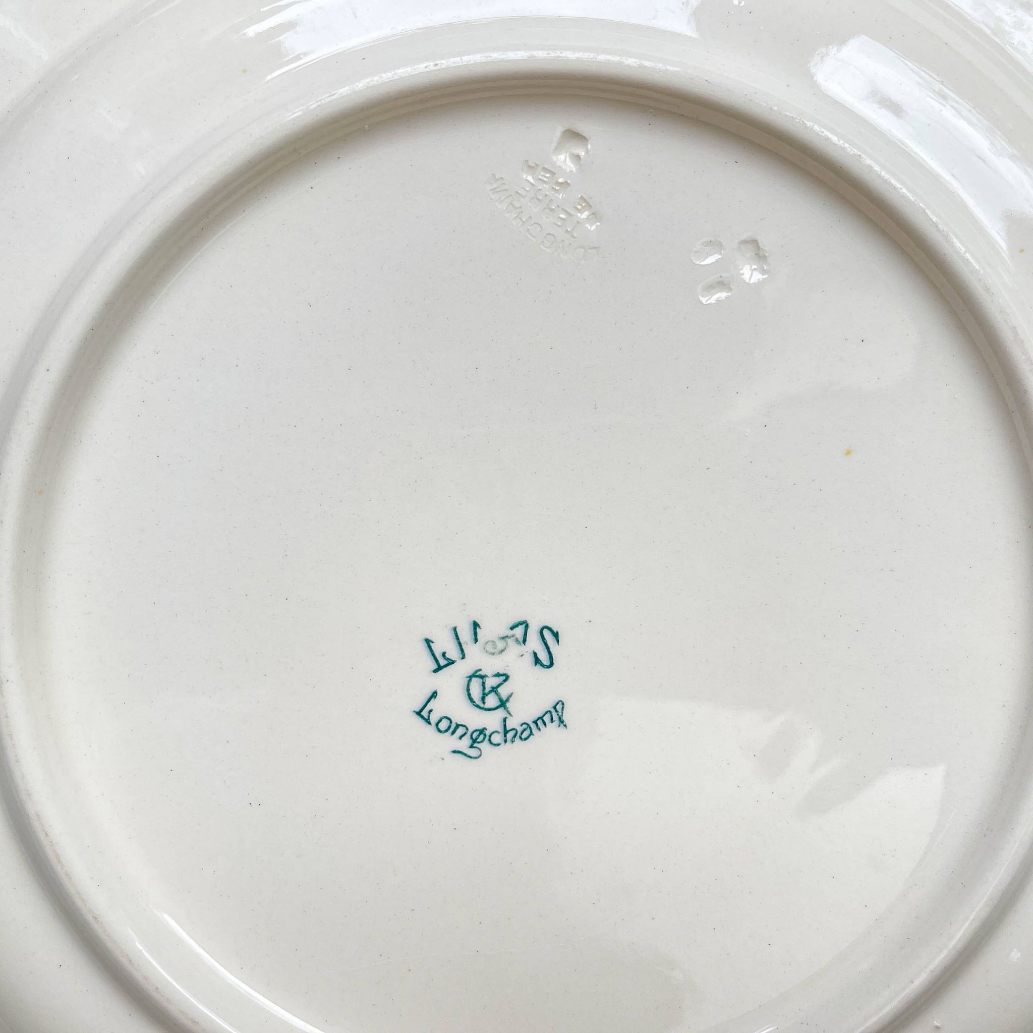 Antique round dish from Terre de Fer "Lilac" – Longchamp 19th century