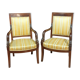 Pair of armchairs to dolphins Empire era in mahogany