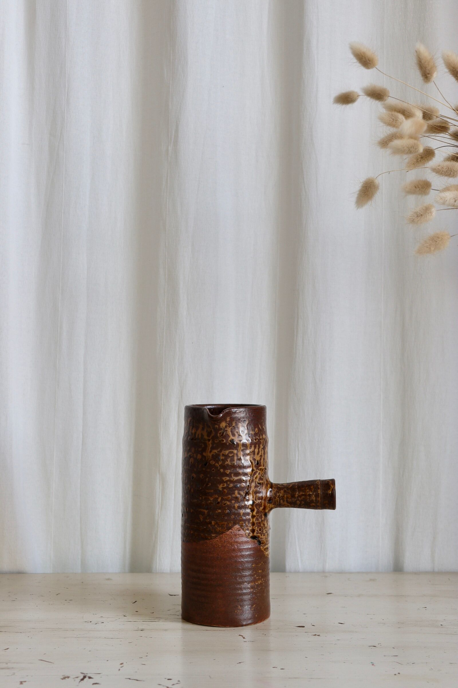 Textured stoneware decanter