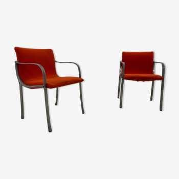 Pair of chairs with armrests