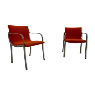 Pair of chairs with armrests