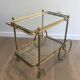 Neoclassical brass rolling table from Maison Baguès