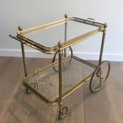 Neoclassical brass rolling table from Maison Baguès
