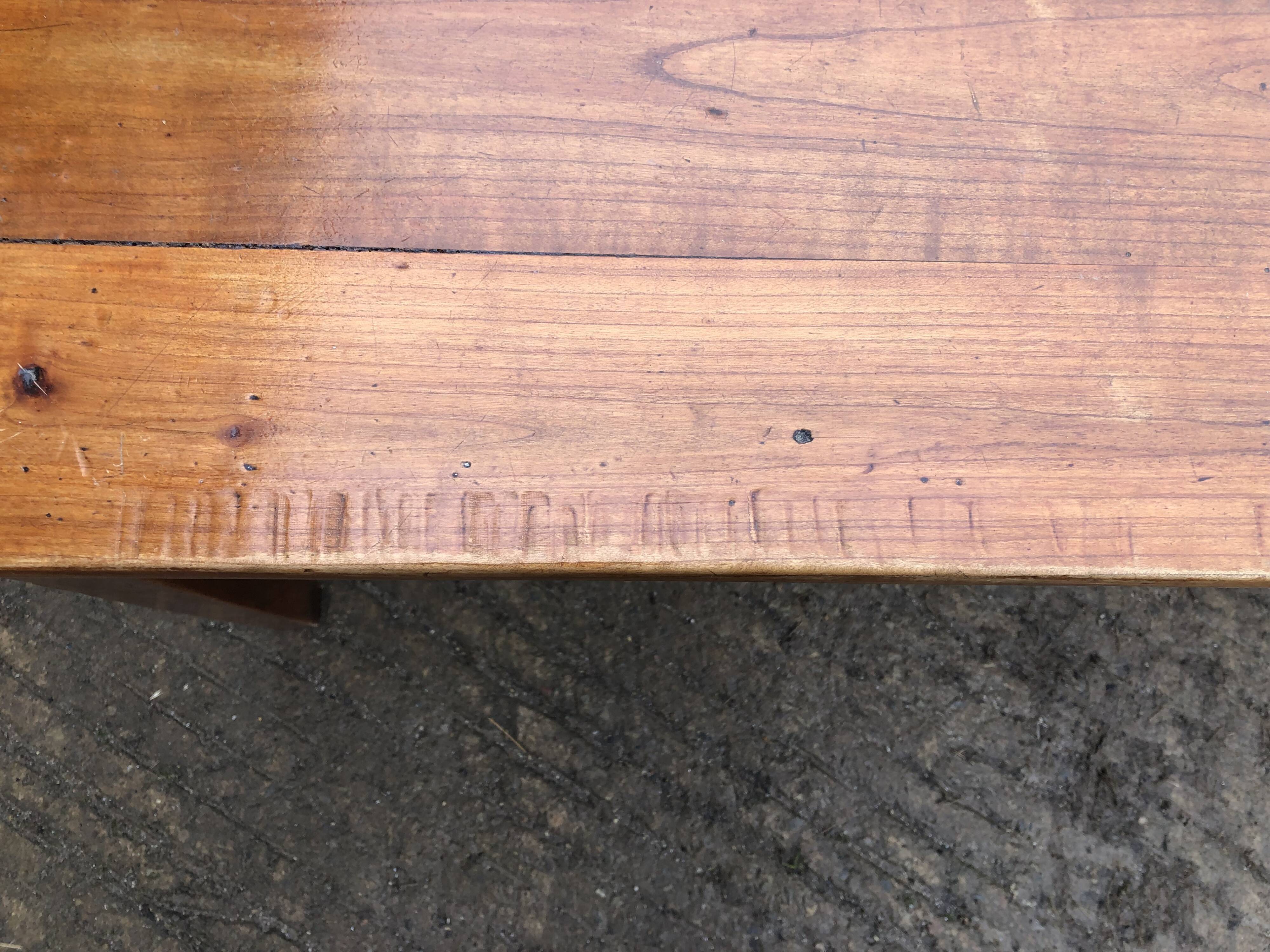 Antique farmhouse table in solid cherry wood with 3 drawers and 1 pull-out.