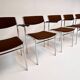 Set of 6 stackable chairs in rust colour by Gijs van der Sluis, 1970s.