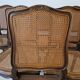 Ensemble de 6 chaises de salle à manger antiques en style Louis XV avec dossier en osier provençal.