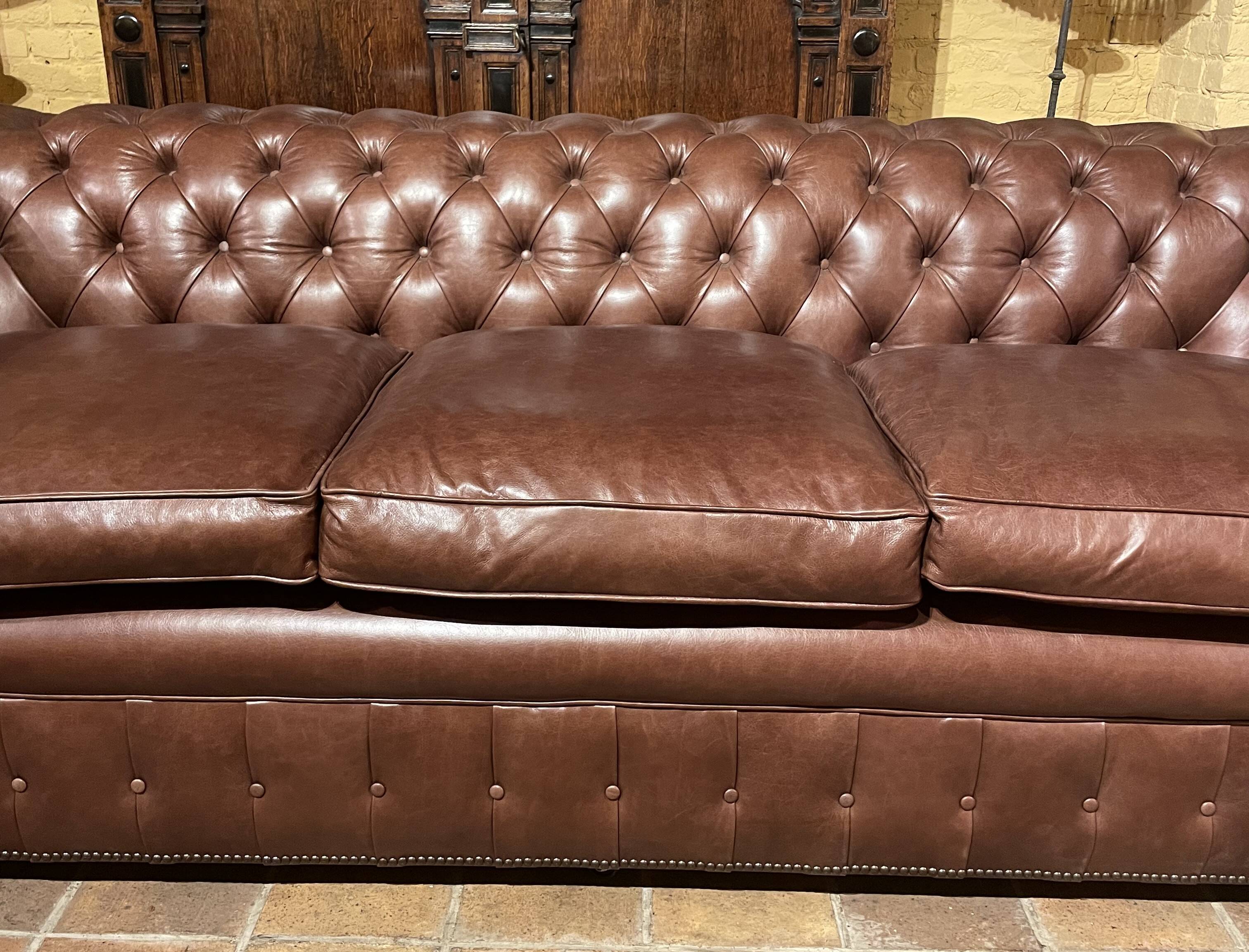 brown leather 3-seater Chesterfield sofa