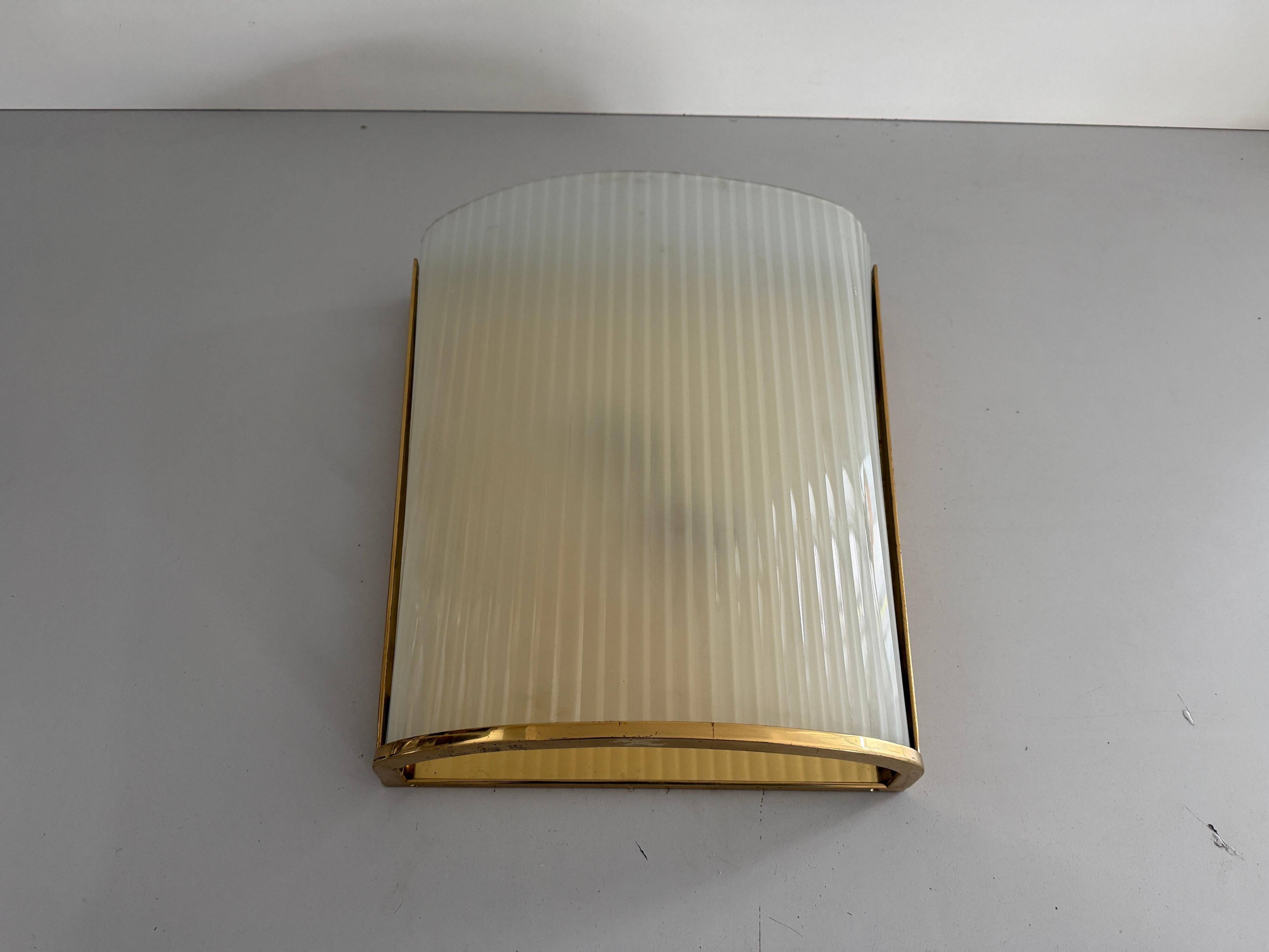 Large heavy glass wall light with a brass frame from the mid-century, 1950s, Italy.