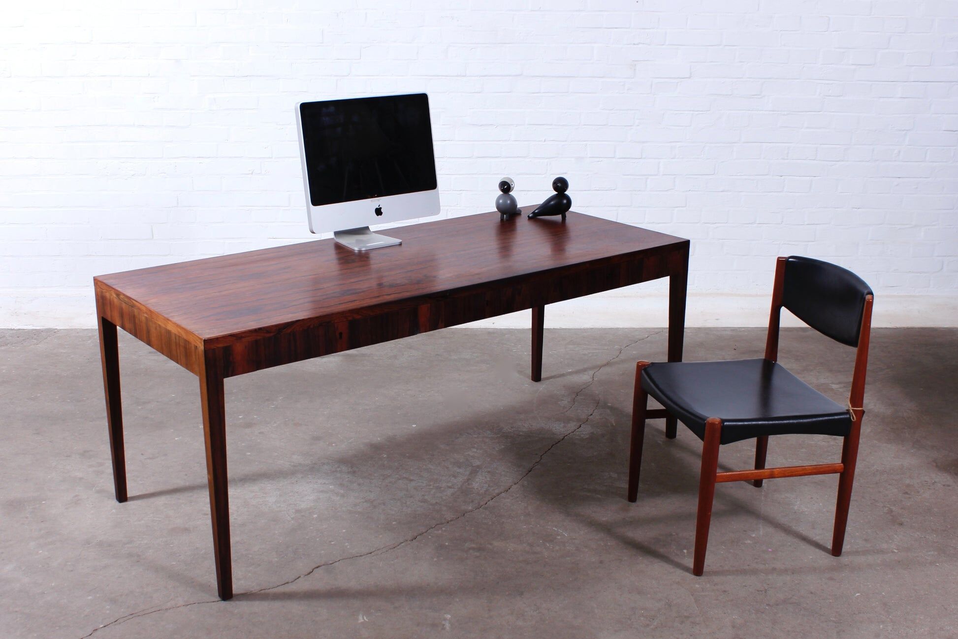 Minimalist rosewood desk by Riis Andersen