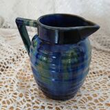Antique pitcher in enamelled ceramic