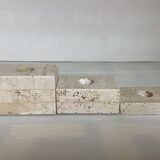 Trio of travertine candlesticks