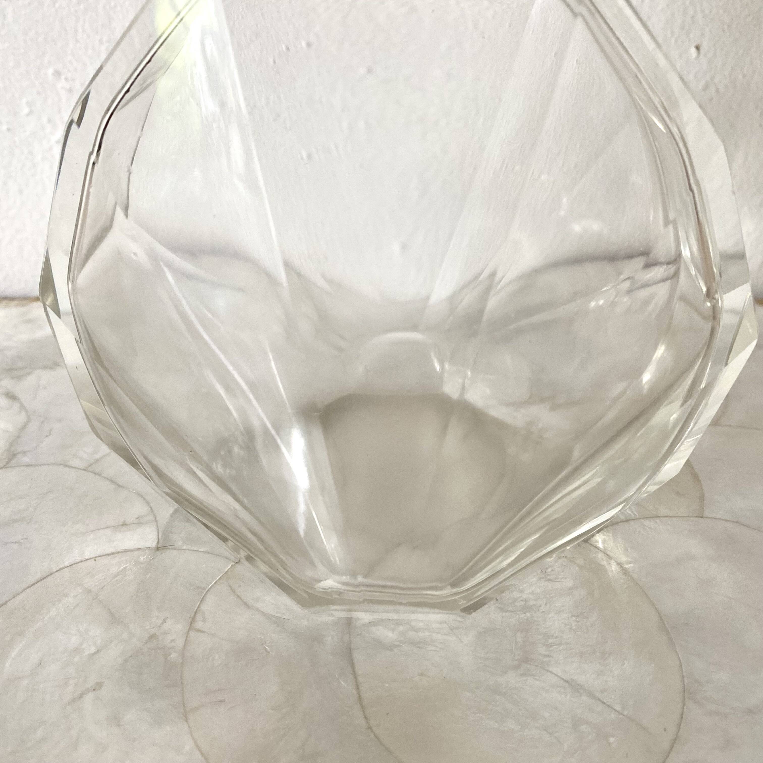 Stylized shell-shaped carafe