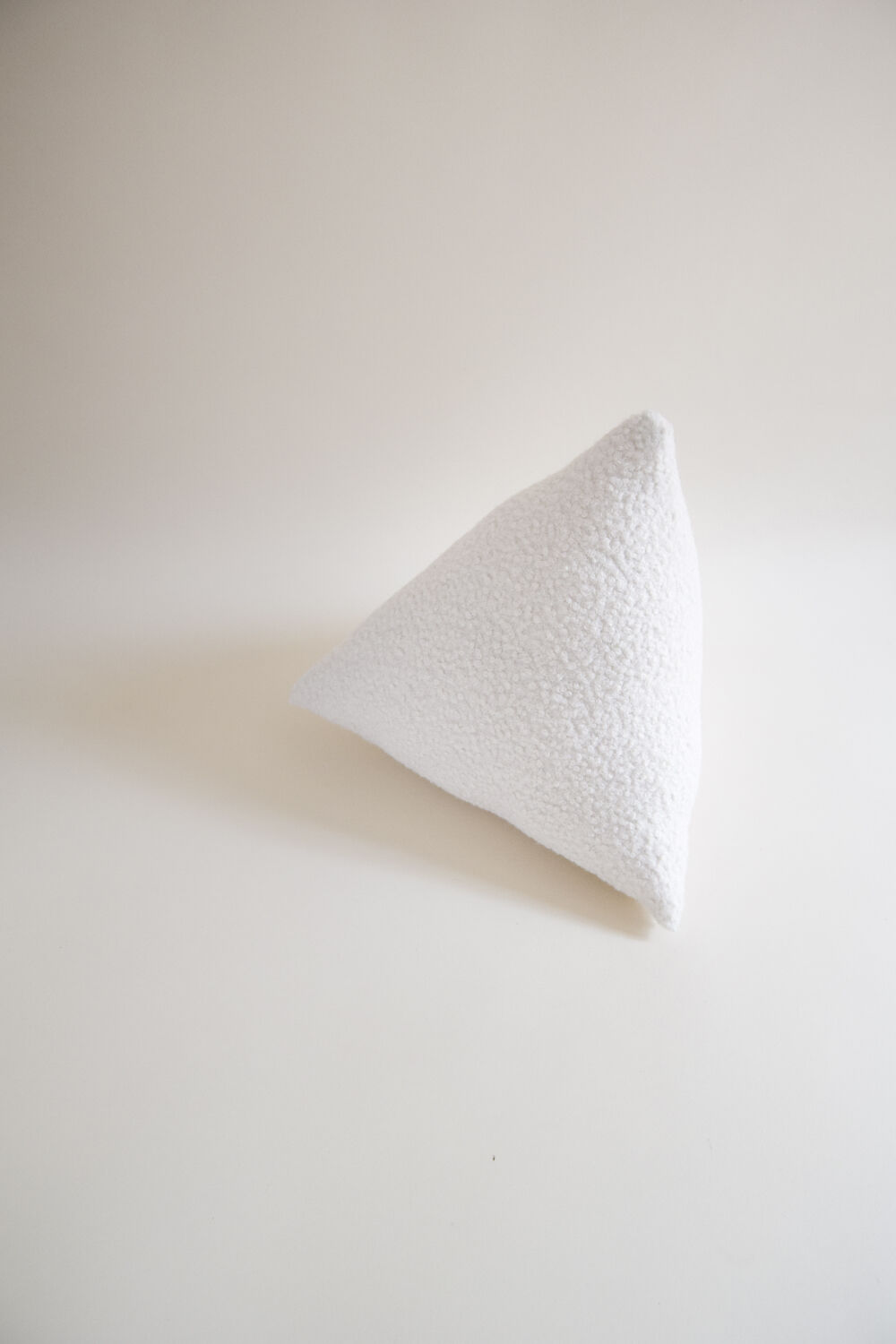 Looped berlingot cushion