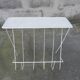 Vintage magazine holder in perforated metal