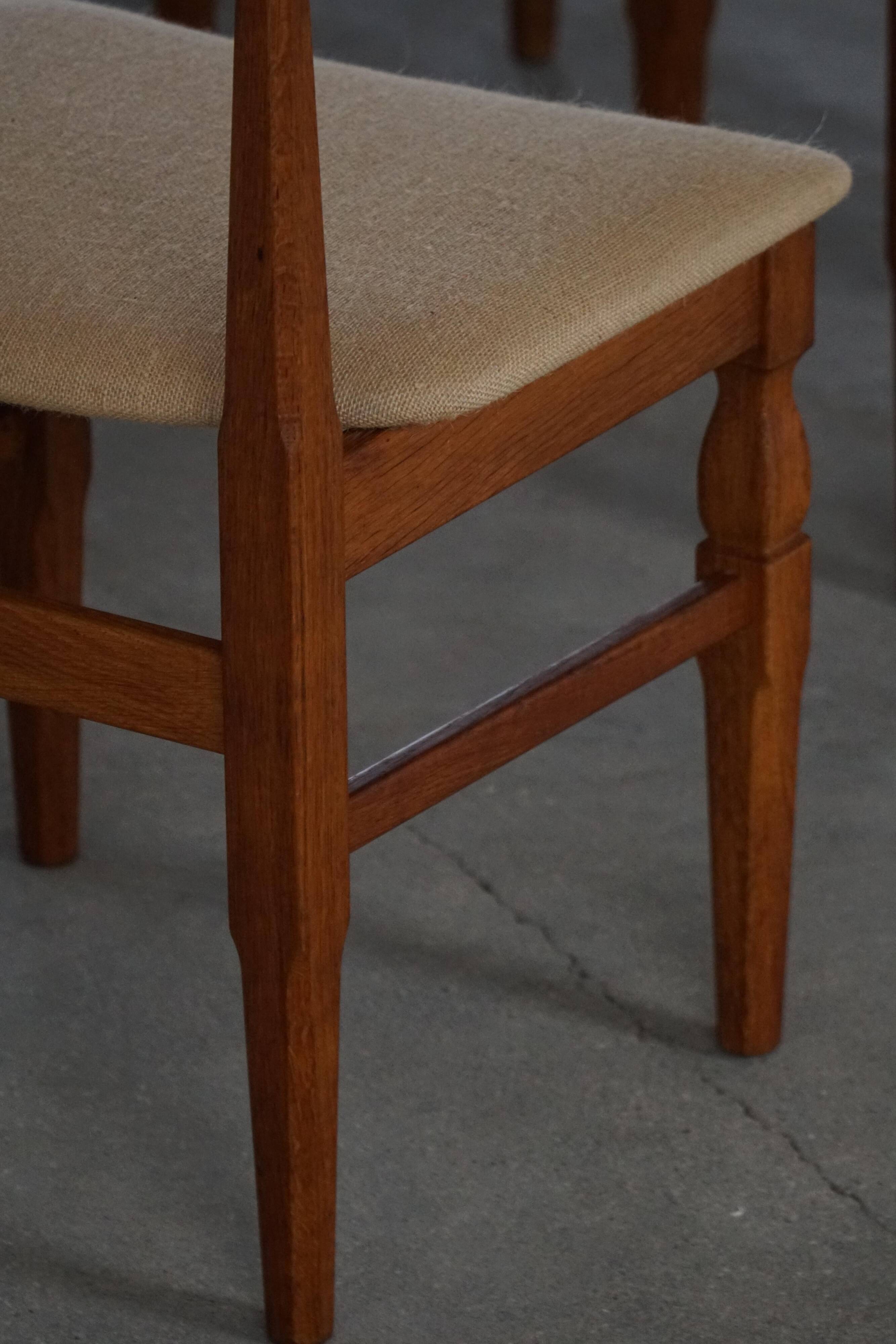 Henning Kjærnulf, set of 8 oak chairs with jute fabric, mid-century Danish, 1960s.