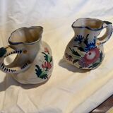 Pair of St Clement pitchers
