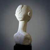 Modernist bust sculpture of a woman in sandstone