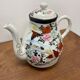 Théière en porcelaine peinte à la main