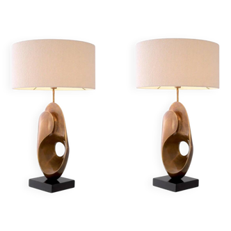 Pair of table lamps in patinated brass and black granite base.