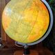 Antique illuminated globe world map made of glass