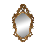 Baroque style oval wall mirror in gilded wood, France