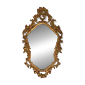 Baroque style oval wall mirror in gilded wood, France