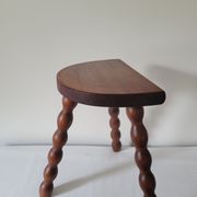 Brutalist stool turned wooden feet