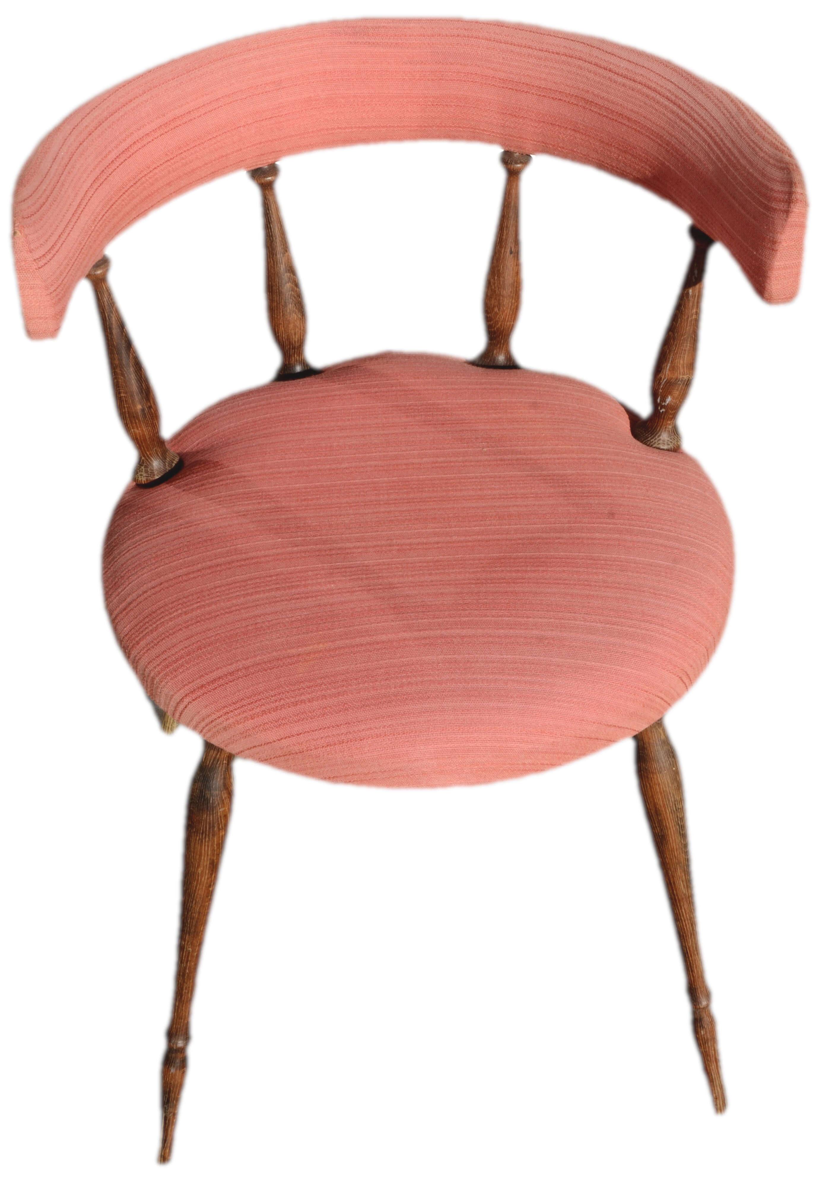 Pink gondola armchair in the style of Helmut.