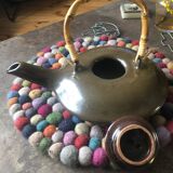 Flat ceramic teapot