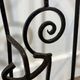 Wall-mounted coat rack in wrought iron, early 20th century