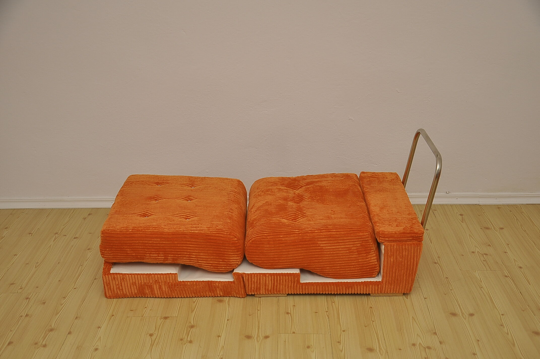 Orange corduroy modular sofa, 1970s.