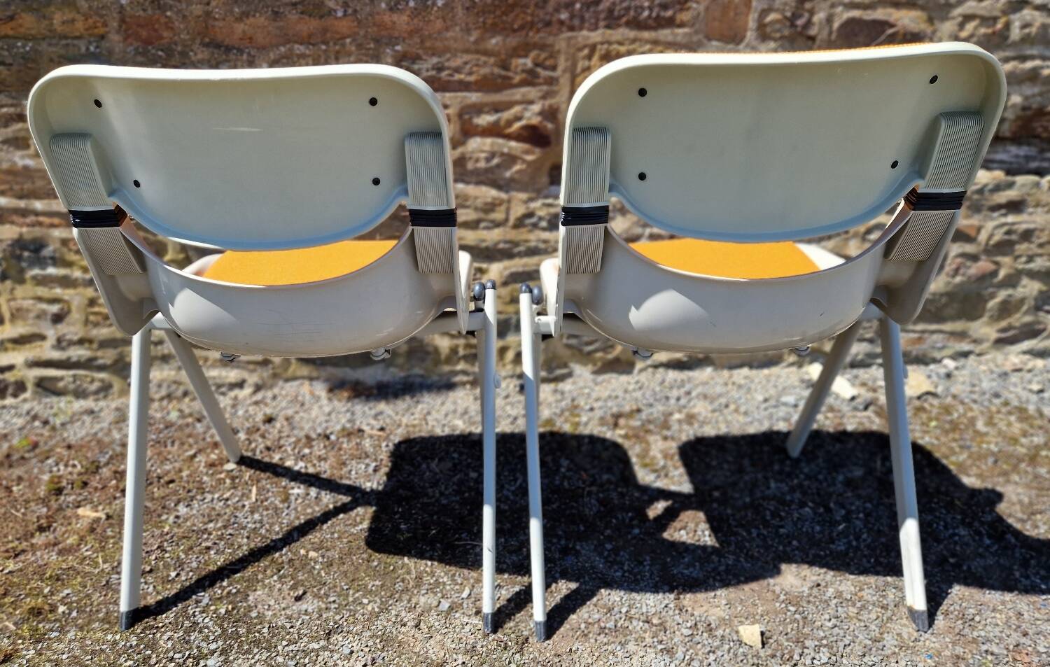 Duo of Dorsal chairs by E Ambasz and G Piretti for OpenArk in 1990