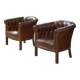 Paire de fauteuils Club capitonnés en cuir