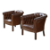 Paire de fauteuils Club capitonnés en cuir