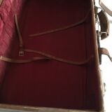 suitcase of leather with labels of palaces