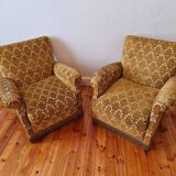 Pair of golden fringed armchairs