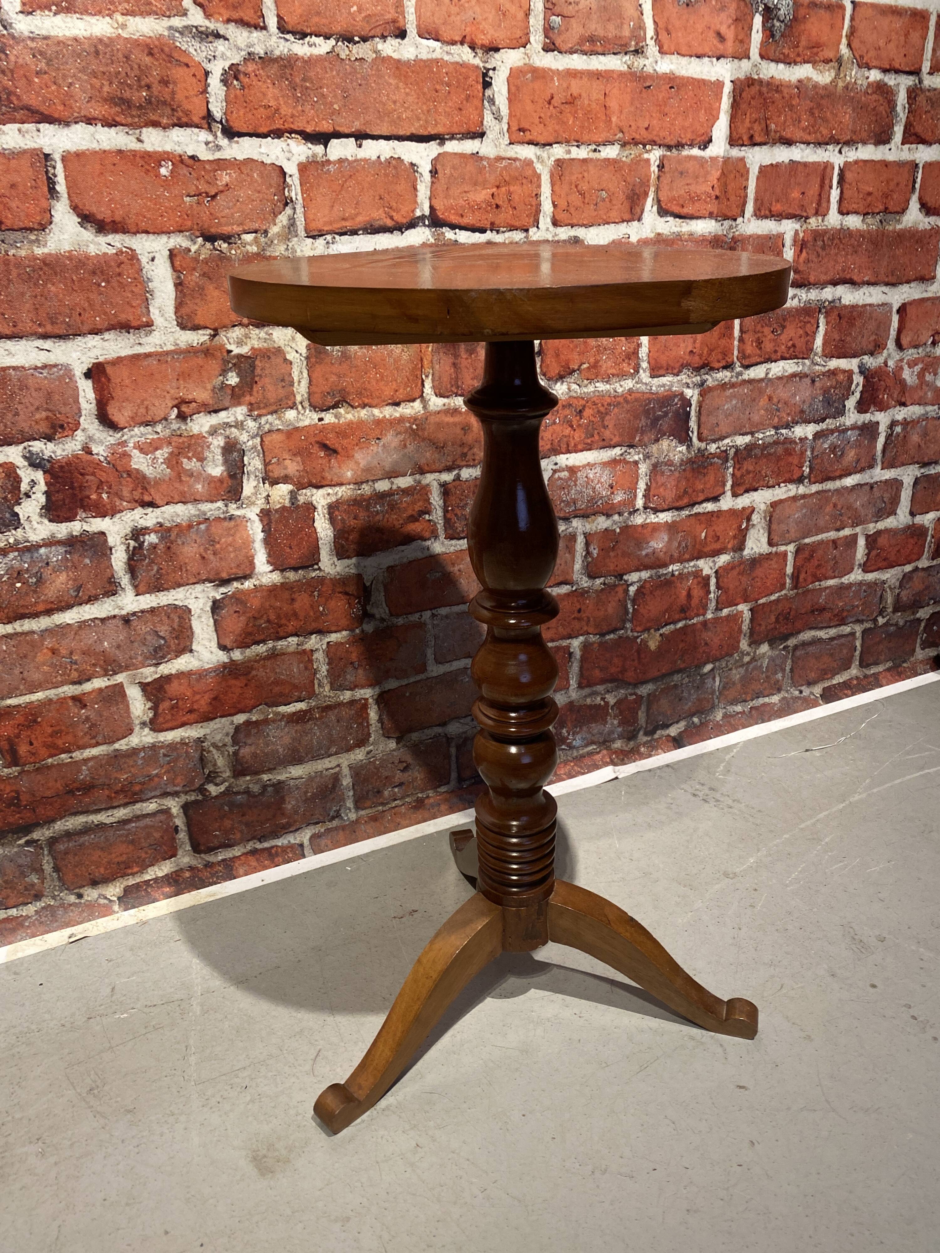 Wooden pedestal table