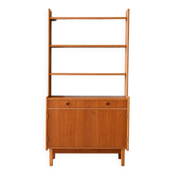 Vintage bookcase with storage compartment
